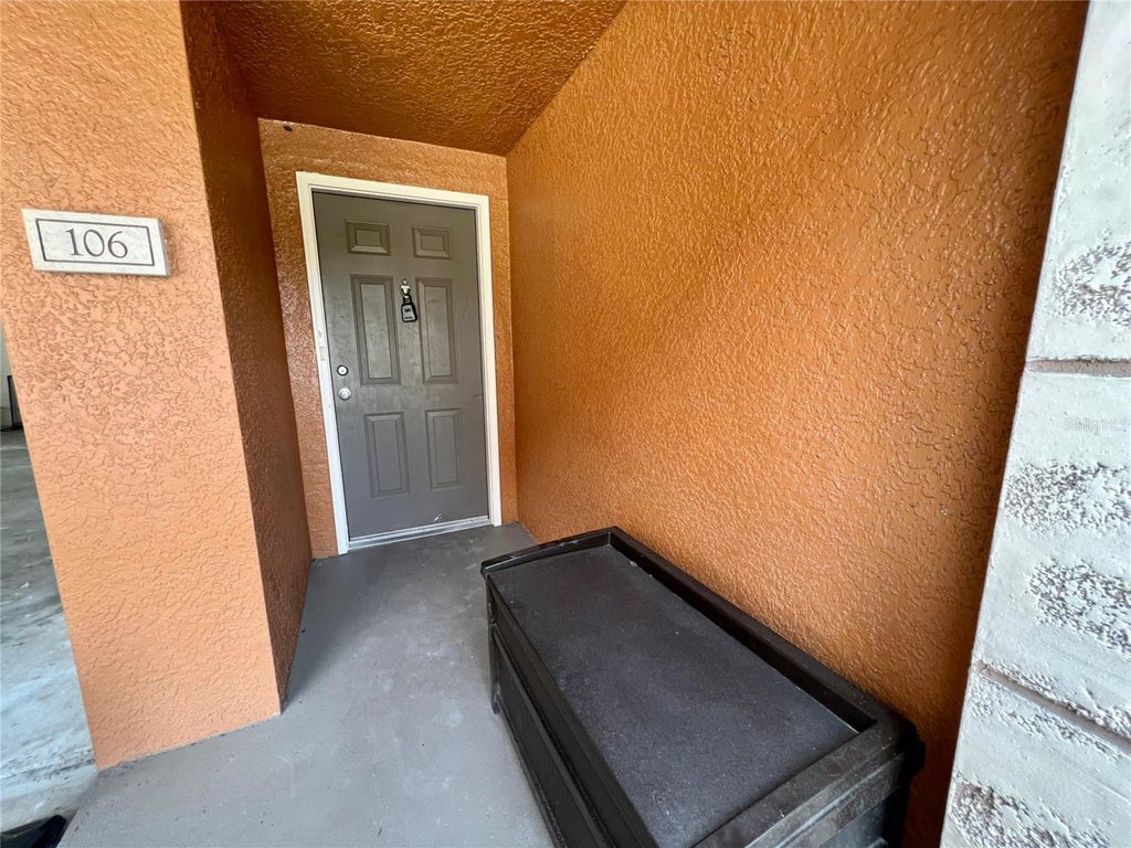Photo of 6111 Metrowest Boulevard #106, Orlando, FL 32835 (MLS # O6439482)