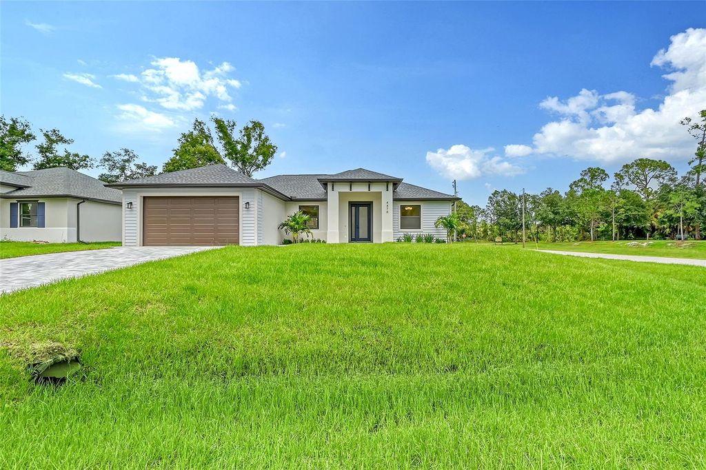 Photo of 4476 Skyway Avenue, North Port, FL 34288 (MLS # A4672861)