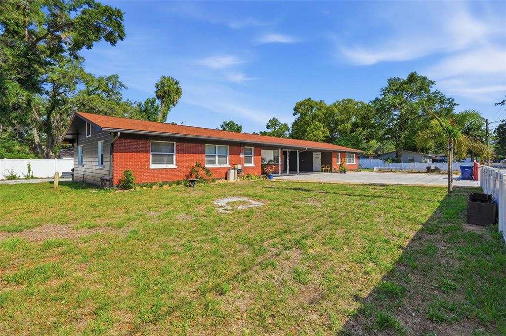 Photo of 10107 N Aster Avenue, Tampa, FL 33612 (MLS # TB8503497)