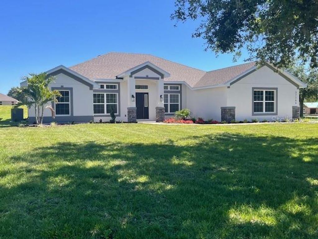 Photo of 37266 Hidden View Cir, Dade City, FL 33523 (MLS # TB8456366)
