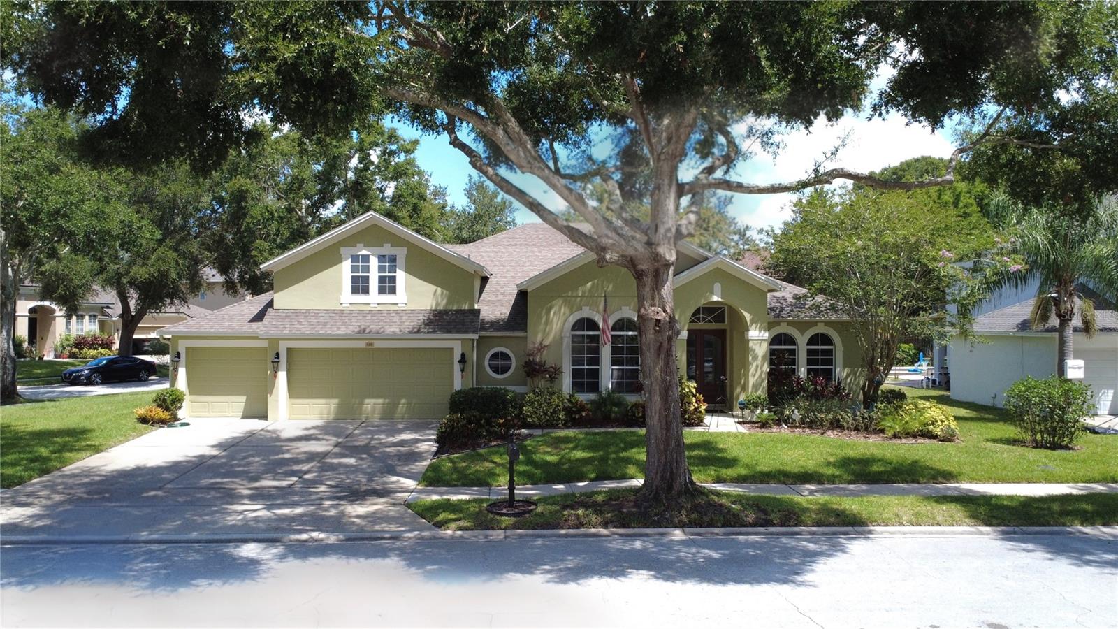 Your search is over! This stunning pool home, located in the highly sought-after gated community of Tuscany at Lake Mary, is the perfect blend of comfort and luxury, offering a lifestyle that is both convenient and full of charm. Situated on a premium oversized corner lot, the home is the definition of "move-in ready," with a spacious and well-designed 3-bedroom, 2.5-bath floor plan that includes an optional 4th office/den and a bonus room upstairs with its own half bath—ideal for a variety of needs. The open-concept design of the home is perfect for modern living, with an eat-in kitchen that overlooks the inviting family room. Sliding glass doors lead directly out to the sparkling pool area, seamlessly blending indoor and outdoor spaces and making it perfect for entertaining family and friends in style. All bedrooms are conveniently located on the first floor in a split plan, ensuring privacy and space. The expansive master suite offers a tranquil retreat with ample storage provided by dual walk-in closets, a luxurious en-suite bathroom featuring dual vanities, a jetted tub, and a separate shower, making it the perfect place to unwind after a long day. The kitchen is a chef’s dream, featuring 42” cabinets, an abundance of storage space, a breakfast bar, and a separate breakfast area that overlooks the beautiful pool area. Additional updates and features of this home include updated wood-look vinyl floors, newly updated light fixtures, a newly landscaped yard, all-new pool equipment, and a solar-heated pool that ensures year-round enjoyment. The home is also equipped with a built-in speaker system both inside and outside, adding to the ambiance of your gatherings. The spacious 3-car garage provides plenty of storage, while the inside laundry room with a utility sink adds to the home’s practicality. The Tuscany at Lake Mary community offers wonderful amenities, including a park, playground, and water access via a fishing pier and gazebo, perfect for enjoying the serene surroundings. This prime location is also convenient to major highways, shopping, dining, and entertainment, offering easy access to everything you need. Truly a must-see property that combines comfort, style, and a fantastic location!