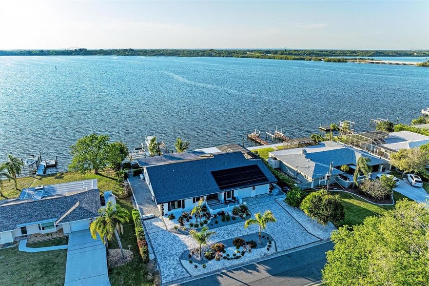 100 Feet of Open Terra Ceia Bay Frontage with Sweeping Full Bay Views, No Fixed Bridges, Sailboat Water and a Private Dock with Two Heavy-Duty Lifts Set the Tone for an Exceptional Waterfront Offering…This 3 Bedroom, 3 Bath Residence Encompasses 3,645 Sq Ft in a No HOA, No CDD Boating Community Designed for Sunset Evenings, Effortless Entertaining and Easy Coastal Living…The Florida Room, Pool, Lanai, Primary Suite and Main Living Areas All Draw the Eye to the Water, Creating a Beautiful Everyday Backdrop and a Seamless Connection to the Bay…The Kitchen Is Appointed with Solid Wood Cabinetry, Granite Countertops, a Wine Refrigerator, Generous Pantry Storage and Direct Access to Covered Outdoor Dining for Gatherings that Flow with Ease…The Water-Facing Primary Suite Opens to the Florida Room and Offers a Spacious Walk-In Closet and a Custom Marble Walk-In Shower with Multiple Shower Heads and Dual Vanities…Additional Highlights Include 100 Feet of Waterfrontage, a Dock Built in 2021, a Saltwater Pool Resurfaced with Pebble Tec, Beautifully Remodeled Secondary Baths, a New Roof in 2025, 8-Foot Interior Doors, Xeriscaped Grounds and a Circular Paver Drive with Side Boat Storage…Rarely Does a Bayfront Property Combine Big Water Views, Boating Functionality and Everyday Comfort so Seamlessly…Ideally Located with Convenient Access to St Petersburg, Tampa International Airport, Sarasota, UTC and Siesta Key Beach…Private Tours Available by Appointment...Schedule Today and Come Live a Fuller Life.