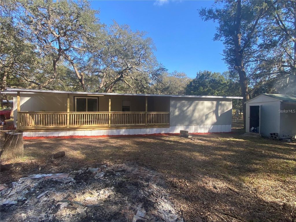 Photo of 103 Burleigh Road, Pomona Park, FL 32181 (MLS # O6368550)