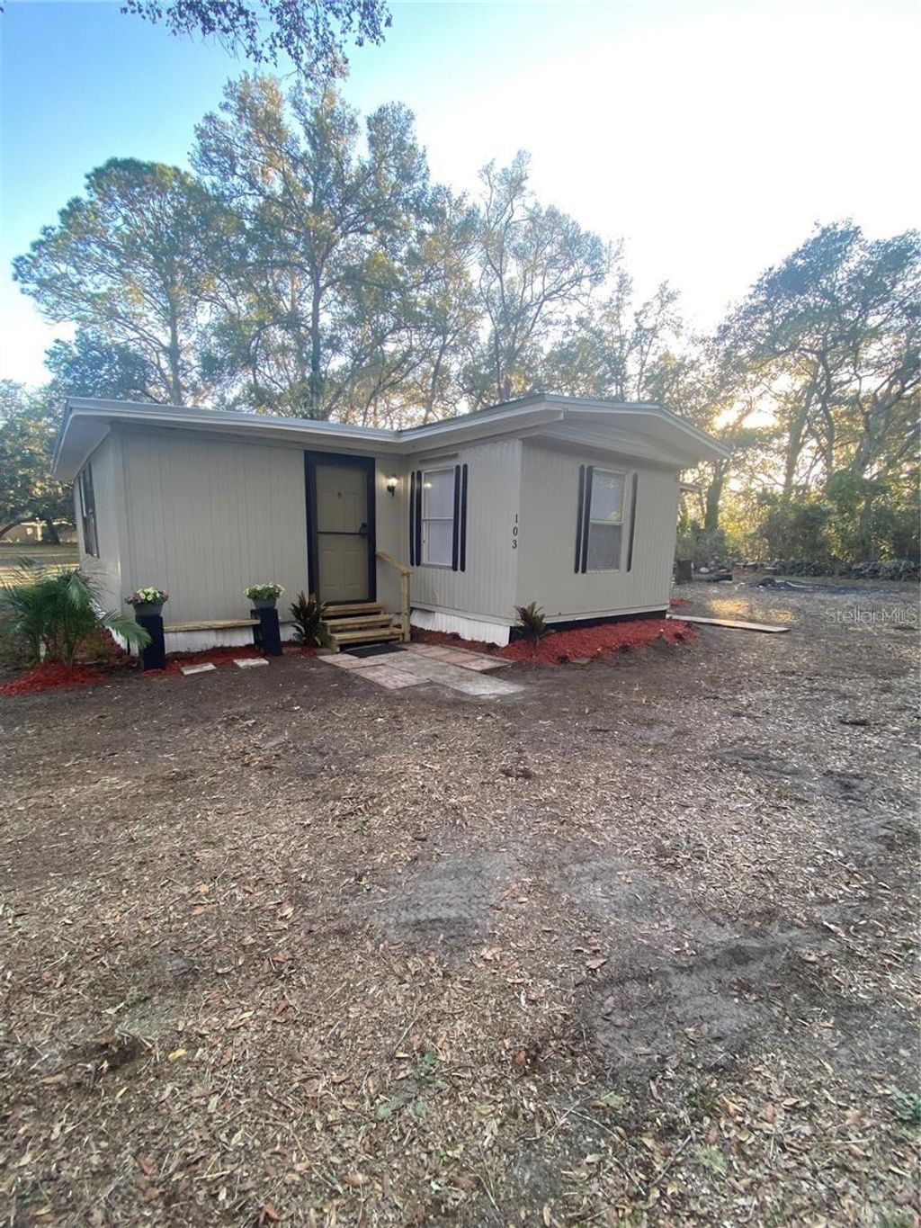 Photo of 103 Burleigh Road, Pomona Park, FL 32181 (MLS # O6368550)