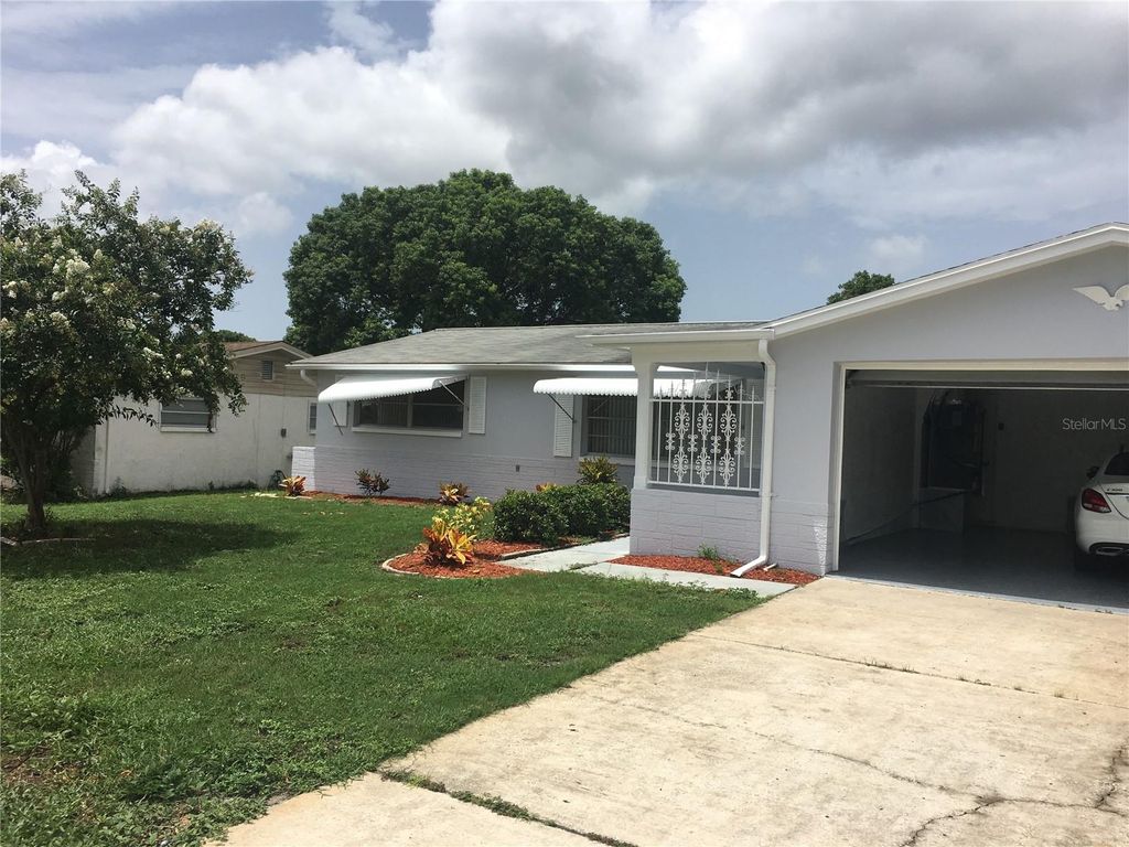 Photo of 3633 Cockatoo Drive, New Port Richey, FL 34652 (MLS # W7882107)