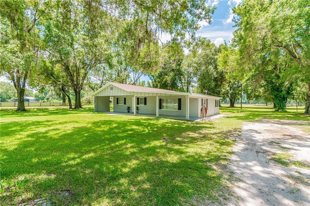 Photo of 1453 Creek Road, Wesley Chapel, FL 33543 (MLS # TB8479752)