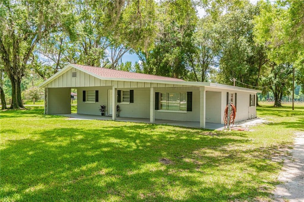 Photo of 1453 Creek Road, Wesley Chapel, FL 33543 (MLS # TB8479752)
