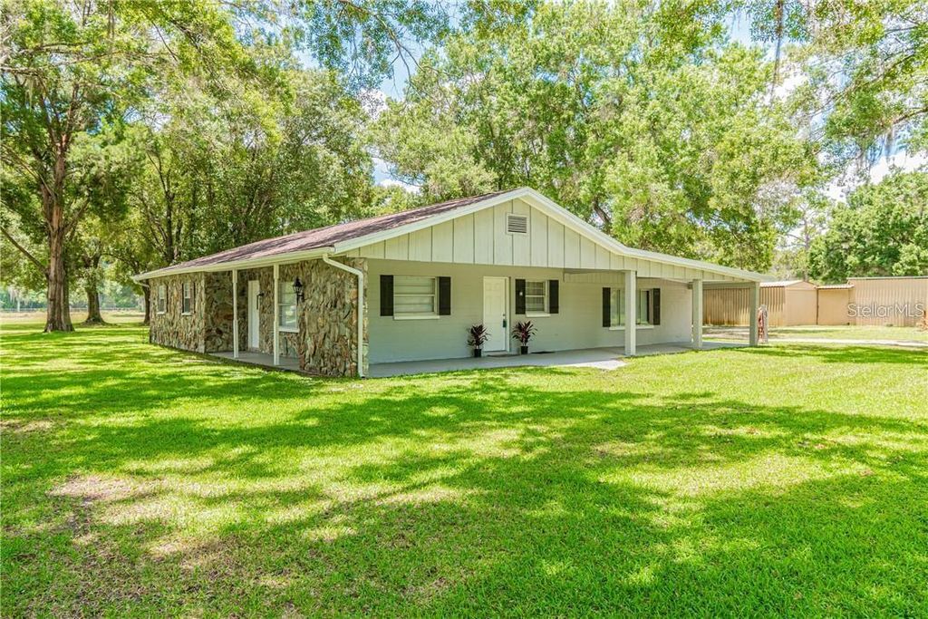 Photo of 1453 Creek Road, Wesley Chapel, FL 33543 (MLS # TB8479752)