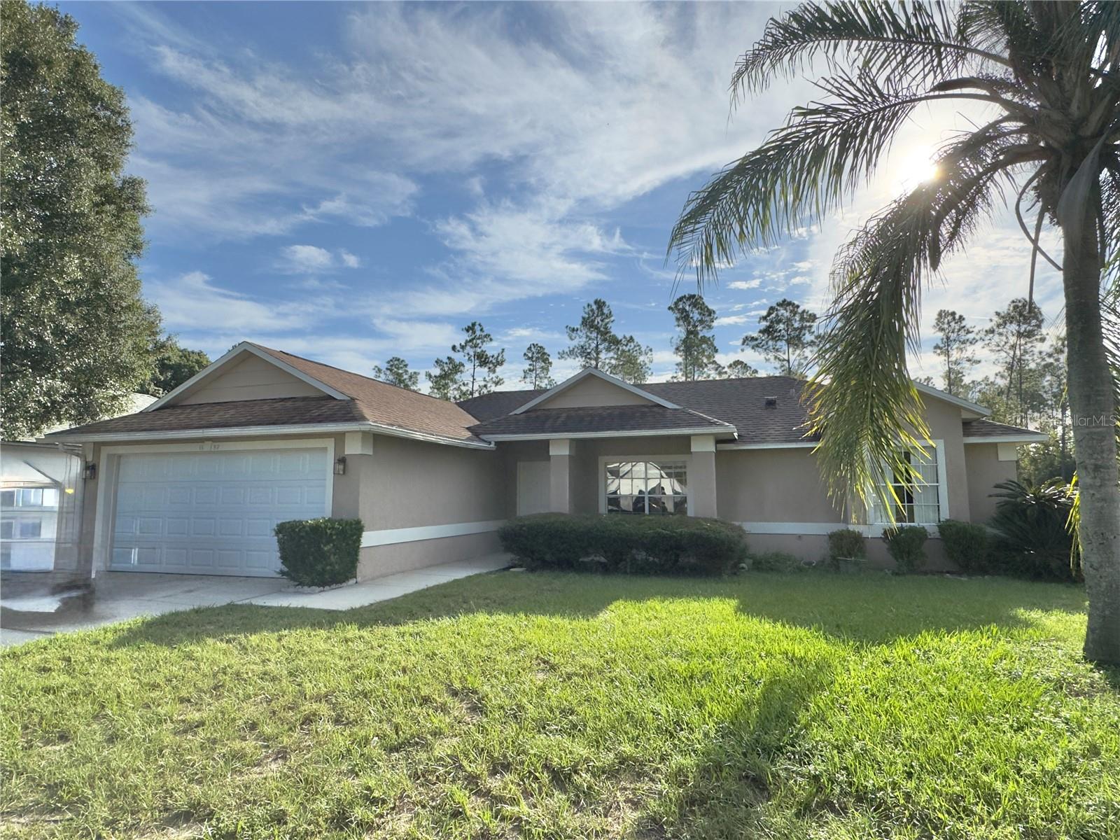 This spacious home features 3 bedrooms, 2 bathrooms, and a 2-car attached garage. Enjoy both a formal living room, dining room, and a comfortable family room perfect for entertaining or relaxing. The home offers a covered front porch and a screened-in back porch with no rear neighbors for extra privacy. Conveniently located near Kelly Park Springs, Rock Springs, shopping, and dining, this property combines comfort and location in one great package. New paint throughout. Available now!