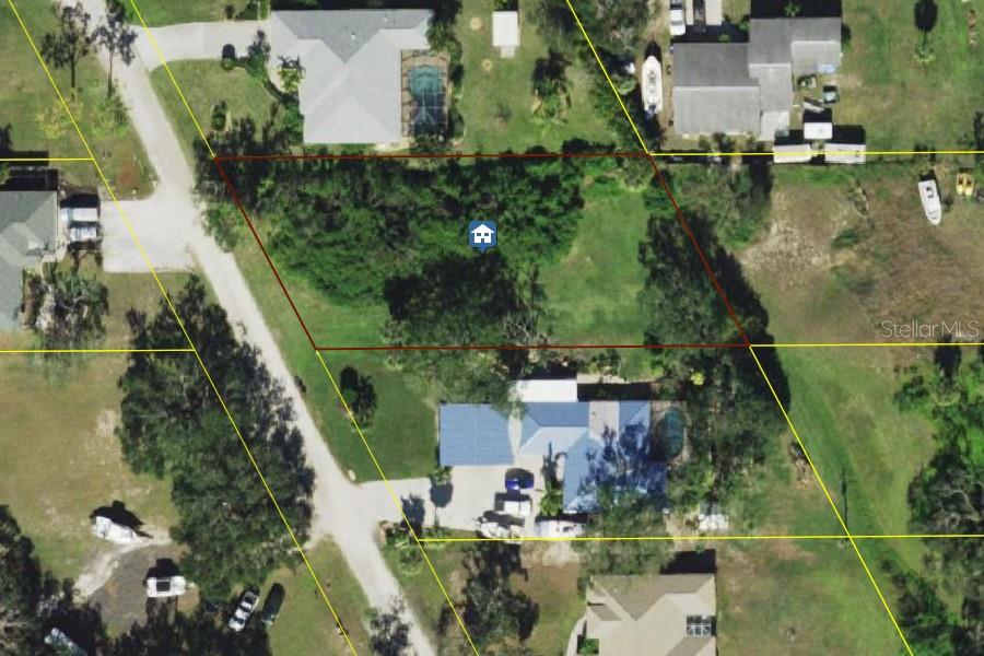 Shopping for a larger lot with all utilities available and great elevation and location? This 100x200 lot offers city water and sewer, high speed internet service, private road and just minutes to Old Englewood Village for shopping and dining and spectacular Manasota Key Beaches. Why settle for HOA dues and zero lot lines when you can spread out on this huge lot with a larger home and still have room for the garden, pets or toy barn. This property is being offered for the first time ever by the family that originally platted this subdivision. Large lots in N Englewood are hard to find so you may want to call on this one quick.