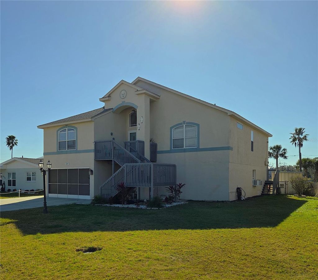 Photo of 6719 Manor Beach, New Port Richey, FL 34652 (MLS # W7883355)