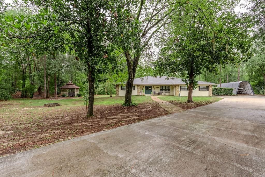 Photo of 20560 SW 92nd Lane, Dunnellon, FL 34431 (MLS # OM723905)