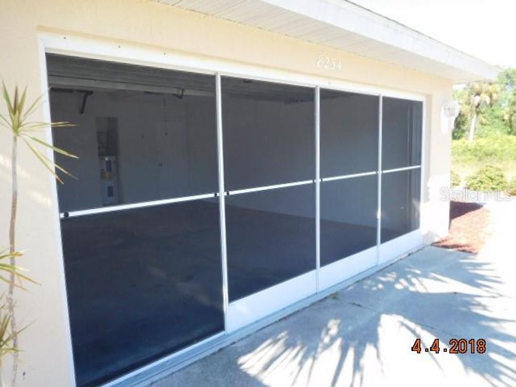 Photo of 8234 Mossborger Avenue, North Port, FL 34287 (MLS # D6146656)