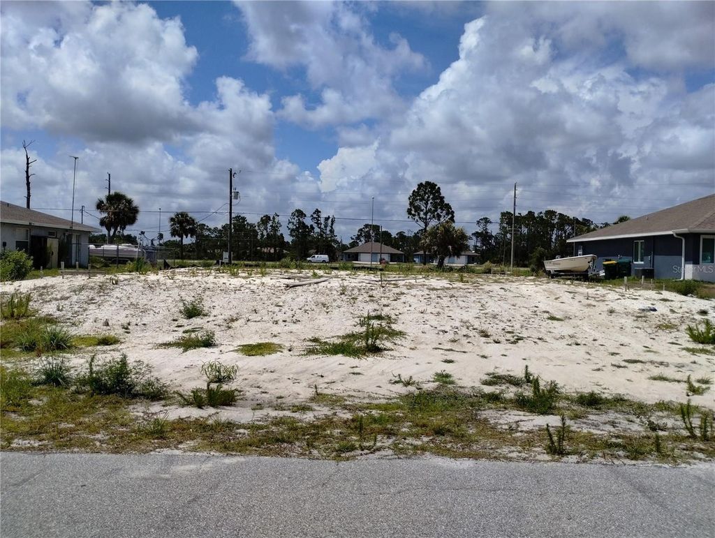 Photo of 11320 Poplin Avenue, Englewood, FL 34224 (MLS # D6142553)