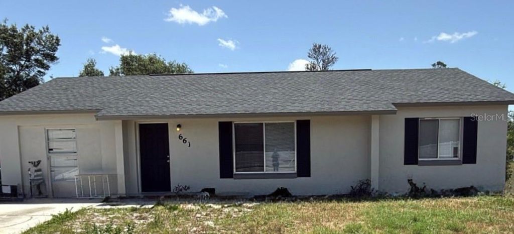 Photo of 661 Gulliver Avenue, Deltona, FL 32738 (MLS # O6383279)