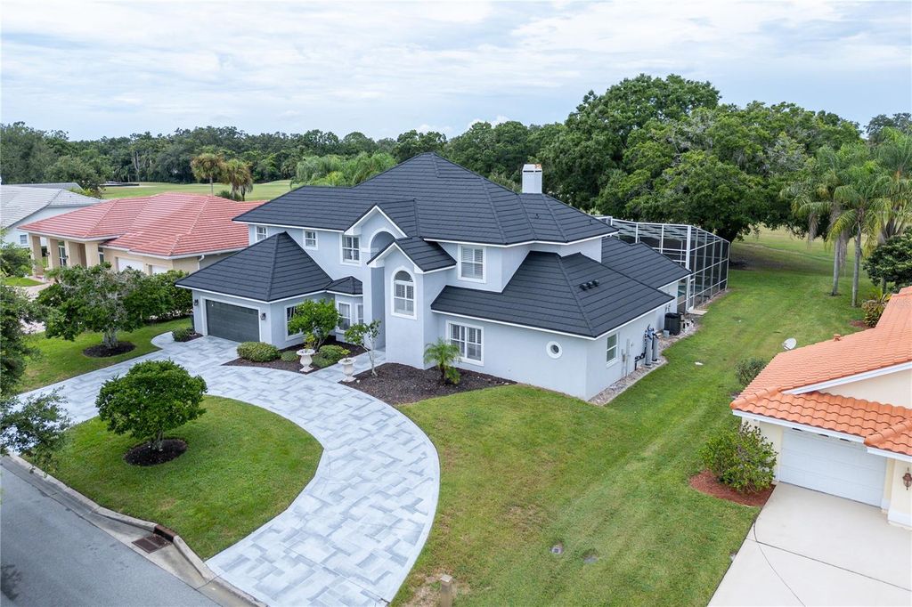 Photo of 30331 Fairway Drive, Wesley Chapel, FL 33543 (MLS # TB8421246)