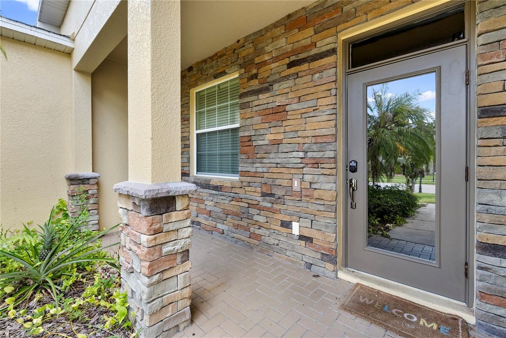 Photo of 2336 Crosston Circle, Orlando, FL 32824 (MLS # O6424349)