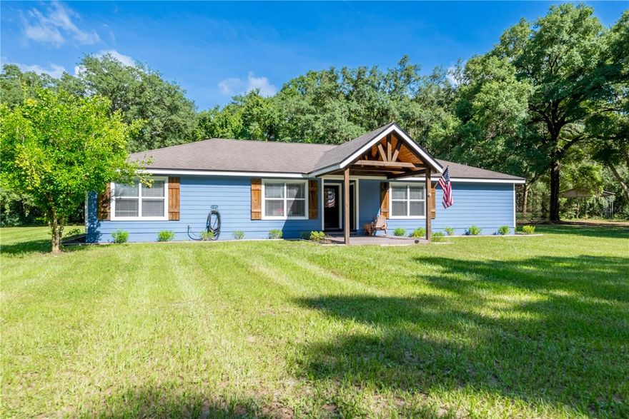 This beautiful 4-bedroom, 2-bath home with an additional multi-purpose room sits on just over 9 acres in Chiefland, Florida, and has been lovingly maintained inside and out. Step inside to find a spacious, light-filled living area perfect for gatherings, along with a well-appointed kitchen featuring ample counter space and storage. The owner’s suite offers a peaceful retreat with its own private bath, while the additional bedrooms are generously sized to accommodate family and guests. The extra room offers endless possibilities—use it as a home office, hobby room, or even a 5th bedroom. A large, covered back porch offers the perfect place to relax or entertain while overlooking the expansive property. The gated entry adds both security and charm, leading to a 4-car garage with an enclosed office or living space—ideal for a home business, workshop, or guest quarters. The property also boasts a large pole barn for equipment or storage and is fully fenced, making it ideal for animals. Located just minutes from downtown Chiefland, you’ll enjoy convenient access to shopping, dining, and schools while still embracing the peace of country living. Outdoor enthusiasts will appreciate being only a short drive from the Suwannee River, Gulf of Mexico, and numerous natural springs for boating, fishing, and swimming.
