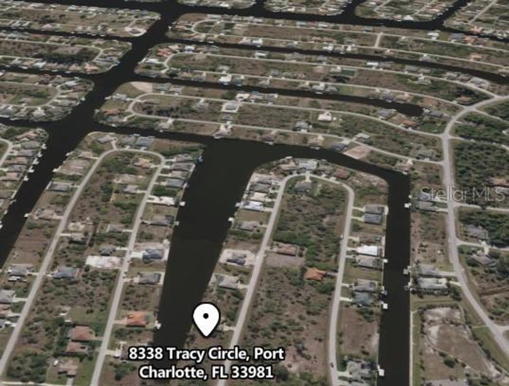 Photo of 8338 Tracy Circle, Port Charlotte, FL 33981 (MLS # D6127548)