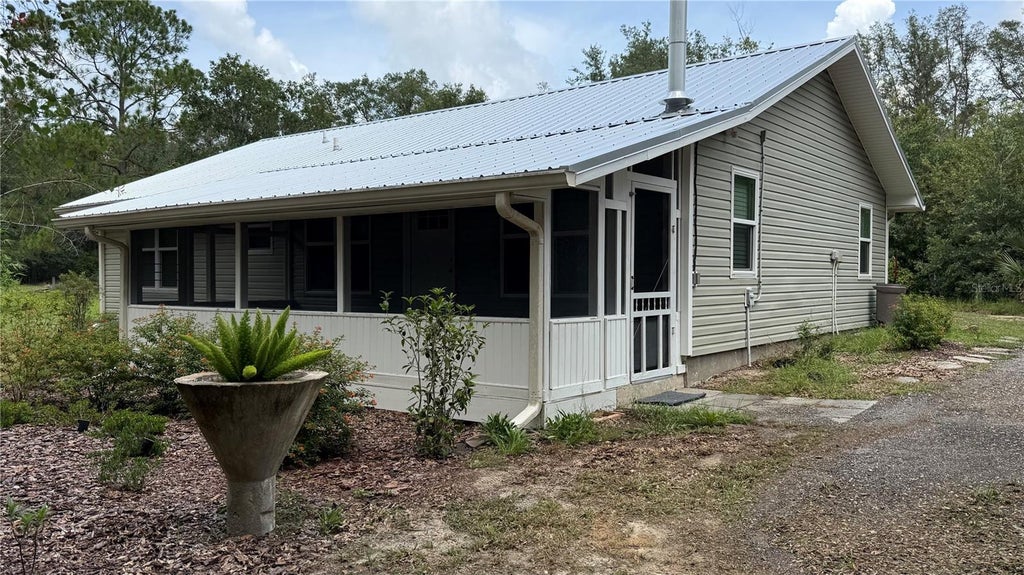 Photo of 1520 Baden Powell Road, Hawthorne, FL 32640 (MLS # OM730923)