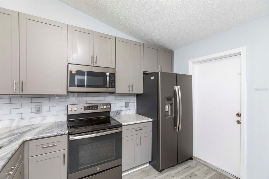 Photo of 327 Phlox Drive #327, Palm Harbor, FL 34684 (MLS # W7885784)