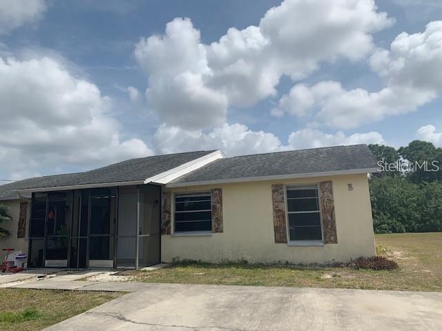 Conveniently located just off McCall Rd, this duplex offers a MODERN YET AFFORDABLE housing option in the quaint coastal city of Englewood. Ready and waiting for immediate occupancy. The interior has been freshly painted, and the HVAC is new. Interior features a living room, kitchen with eat in space, two bedrooms and a shared bathroom. The home is open and airy with laminate flooring which makes for low maintenance. Small, screened seating area at both the front and back of the duplex. Spacious backyard on a freshwater canal. Lawn care is included. A trip to the gorgeous Gulf Beaches along Manasota Key is a short car ride away. Shelling, shark tooth hunting or just a lazy day in the sun are all at hand. Great Mom and Pop dining options all about. Call for your showing today.