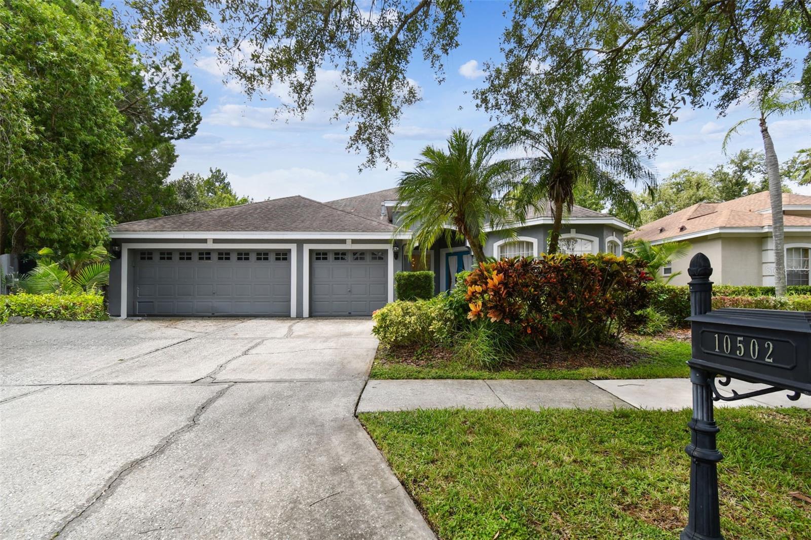 Located in the heart of Tampa’s highly desirable Westchase community, this impressive 5-bedroom, 3-bathroom residence offers 3,338 sq ft of thoughtfully designed living space on one of the largest lots in the neighborhood.
Step inside to discover a spacious open floor plan that effortlessly blends comfort and functionality. A formal dining room sets the stage for elegant entertaining, while the expansive living area flows seamlessly into a gourmet kitchen featuring granite countertops, stainless steel appliances, and a striking quartz island—perfect for both casual meals and hosting guests.
Designed with privacy in mind, the home features a split-bedroom layout with the luxurious primary suite on one side and the remaining bedrooms tucked away on the other. Upstairs, a versatile loft offers the perfect setting for a movie theater, game room, or private home office.
Enjoy the convenience of a 3-car garage, ample storage, and an oversized backyard with endless potential—ideal for outdoor living, entertaining, or even a future pool.
Situated in one of Tampa’s most sought-after communities known for its tree-lined streets, top-rated schools, and vibrant amenities, this home offers the perfect combination of space, style, and location.
Don't miss this rare opportunity to own a showcase property in Westchase.