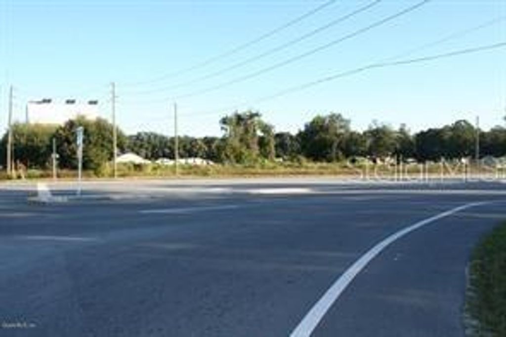 Photo of 13121 S Us Highway 441, Summerfield, FL 34491 (MLS # OM716490)