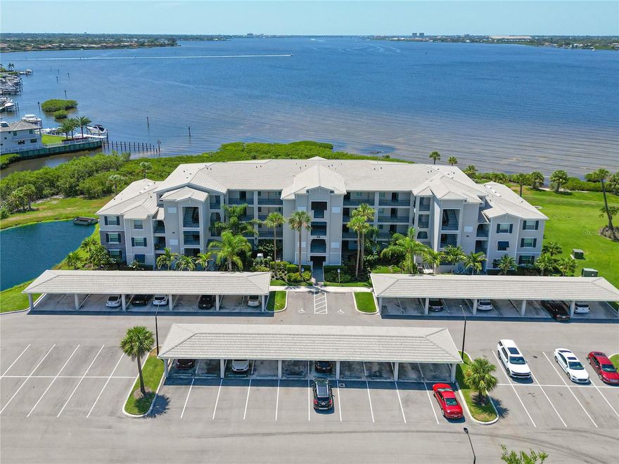 Quintessential Top Floor Carolina model condominium with full Manatee River views located in the Shores of Tidewater. Arguably the best location in the entire complex, located in the highly desirable building one, on the Top floor and bonus it’s an END unit. The owner will finance with 20% down at 5.5% interest rate with Full price offer. Featuring 3 true bedrooms and 2 bathrooms. Rarely available and ready for new owners. This condo is directly across from the pool and gym! Tidewater Preserve is Southwest Florida’s premier boating community. Three community pools(one with FULL RIVER VIEWS), two 24/7 fitness centers, kayak and canoe launch, dog park, tennis courts, two clubhouses, MARINA, and a friendly and beautifully maintained community. Smart home with Ruckus router controlling thermostat, front door and more. Breathtaking waterfront views from living area and master suite and SUNSETS year-round. Super pet-friendly development! This Original owner has spared no expense. My favorite part is the entire space has coastal looking Laminate floors throughout the condo and only two of the bedrooms have carpet. Featuring a stunning Upgraded kitchen with Top of the line appliances, and an Exquisite glass tile backsplash. Pantry storage and additional hall closet allow every cook the space they need. Your open space living area flows into your entertainment area with stylish furnishings and automatic rolling shades on sliders and side window. A few furnishings may be left for the buyer's convenience. Your Primary bedroom retreat boasts an en-suite bath, plus two walk-in upgraded closets and also featuring full River views. Your guest area has a large dual sink vanity, Framed Mirror, along  with shower/tub combo and plenty of space with private access from both guest room and hall. A third flexible room offers additional bedroom, office, or whatever you need. Closet space abounds. Separate laundry room, upgraded Washer and dryer have been elevated with storage that eases space concerns. There is an adjacent storage unit outside and only steps from your door to store bikes, golf clubs, and overflow belongings. This home has been impeccably upgraded to be both stylish and functional. Come and see what you can enjoy in sunny Florida. Within 15 minutes of Sarasota airport (SRQ) and 45 minutes of Tampa International (TPA). This home could be either your primary residence or winter home in a highly sought-after community that still has affordable marina space where your boat can be accessible and secure. There is currently a short wait list for boat slips. The activities director can explain how the boat slips in the Marina are handled. The listing agent also owns a unit in the same building and would love to give you a tour!