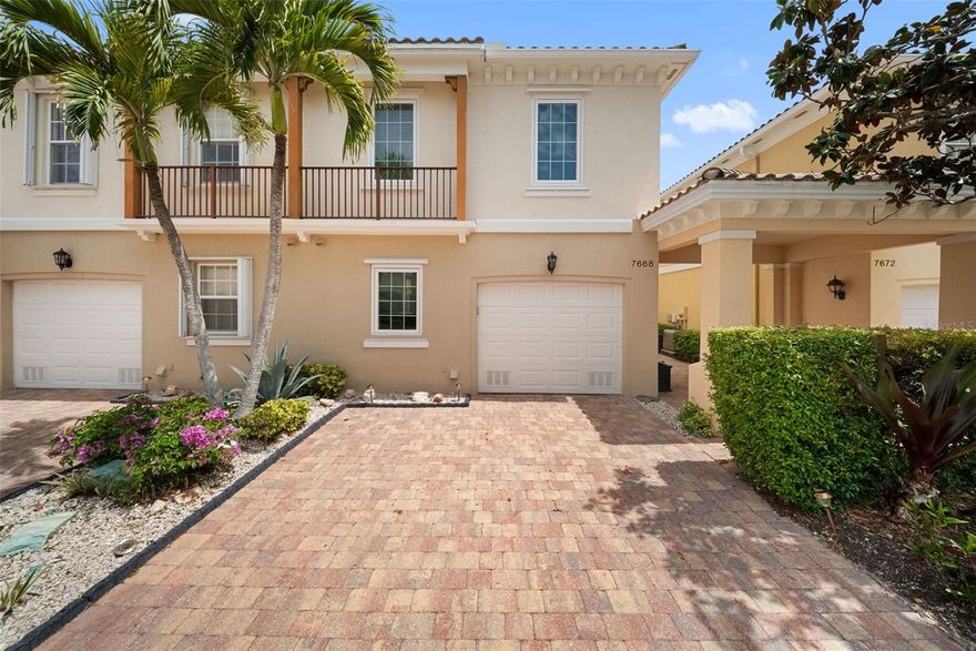 Beautifully updated 3-bedroom, 2.5-bath Catalina townhome in the highly desirable Villagewalk on Palmer Ranch, offering a dynamic, amenity-rich setting ideal for full-time living. The interior features a stylish kitchen with quartz countertops, stainless steel appliances, and a tile backsplash, along with updated bathrooms and two well-appointed guest bedrooms. Additional upgrades include IMPACT windows, accordion shutters on the great room sliders, a/c 2018, plantation shutters in bedrooms and remote-controlled blinds in the great room. Enjoy the serene views from the spacious screened lanai, surrounded by refreshed landscaping that enhances privacy and outdoor living. Residents enjoy an exceptional lineup of amenities including a restaurant and tiki bar, resort and lap pools (both geothermal heated), pickleball courts, and six lighted Har-Tru tennis courts. The community also features a fitness center, clubhouse, event space, boutique, hair salon, and on-site gas station. An HOA manager and activities coordinator provide a full calendar of events, creating an engaging and social atmosphere year-round. Miles of walking trails, scenic bridges, and lakes weave throughout the lushly landscaped grounds. A 24-hour manned gate adds security, while HOA fees include irrigation and landscaping for low-maintenance living. Conveniently located near Siesta Key Beach, the Legacy Trail, shopping, dining, medical facilities, and the arts. A perfect opportunity to enjoy an active, connected lifestyle in one of Sarasota’s most sought-after communities.