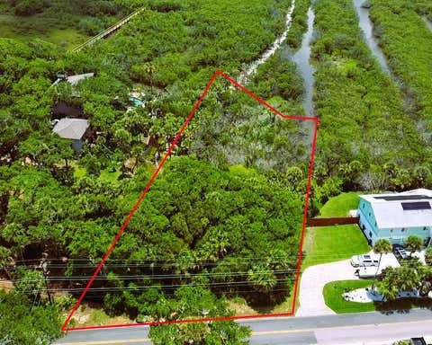 Photo of 4168 Saxon Drive, New Smyrna Beach, FL 32169 (MLS # NS1088387)