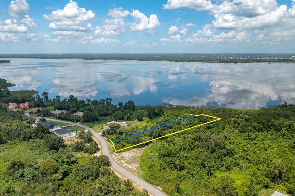 Photo of 9041 S Bay Drive, Haines City, FL 33844 (MLS # P4937157)