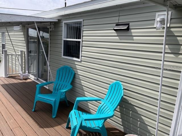 Completely renovated 3/2 canal home in highly sought-after neighborhood for serene lifestyle. Direct access to the intracoastal and India River Lagoon, perfect for kayaking and boating. Beautifully renovated manufactured home with 3 bedrooms and 2 baths. New flooring throughout. Comfortably sized rooms, remodeled kitchen, large master bedroom with en-suite, and remodeled guest bathroom. Large spacious Trex deck (8x22) with solar lights and steps. Home has ample yard space with shed and is completely fenced in. New roof < 7 years old. Seawall redone 6 years ago. Close to many restaurants, beaches, parks and all Orlando attractions. Homes do not last long in this community of South Waterfront Park.