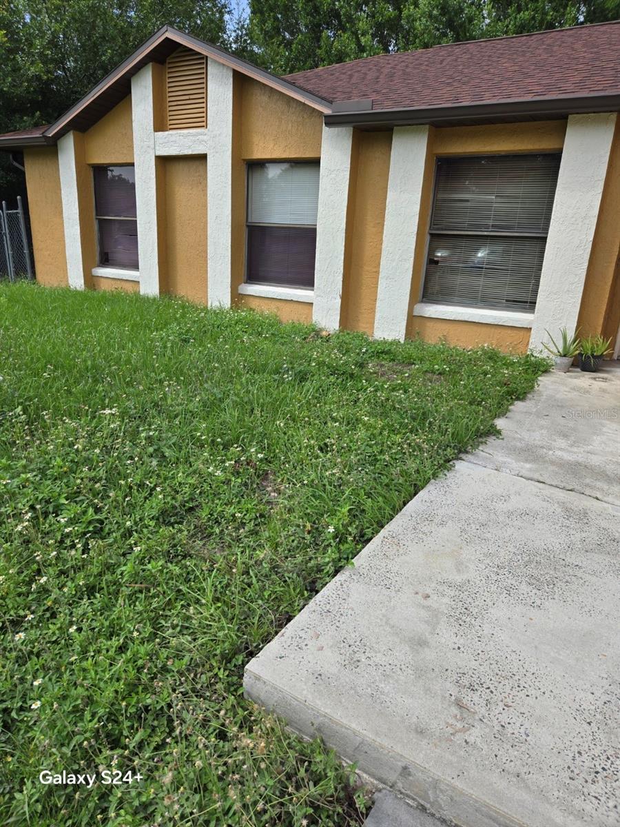 A must see! Newly remodeled Kitchen and bath. Large screened in area for entertaining. Close to bus-line and shopping.