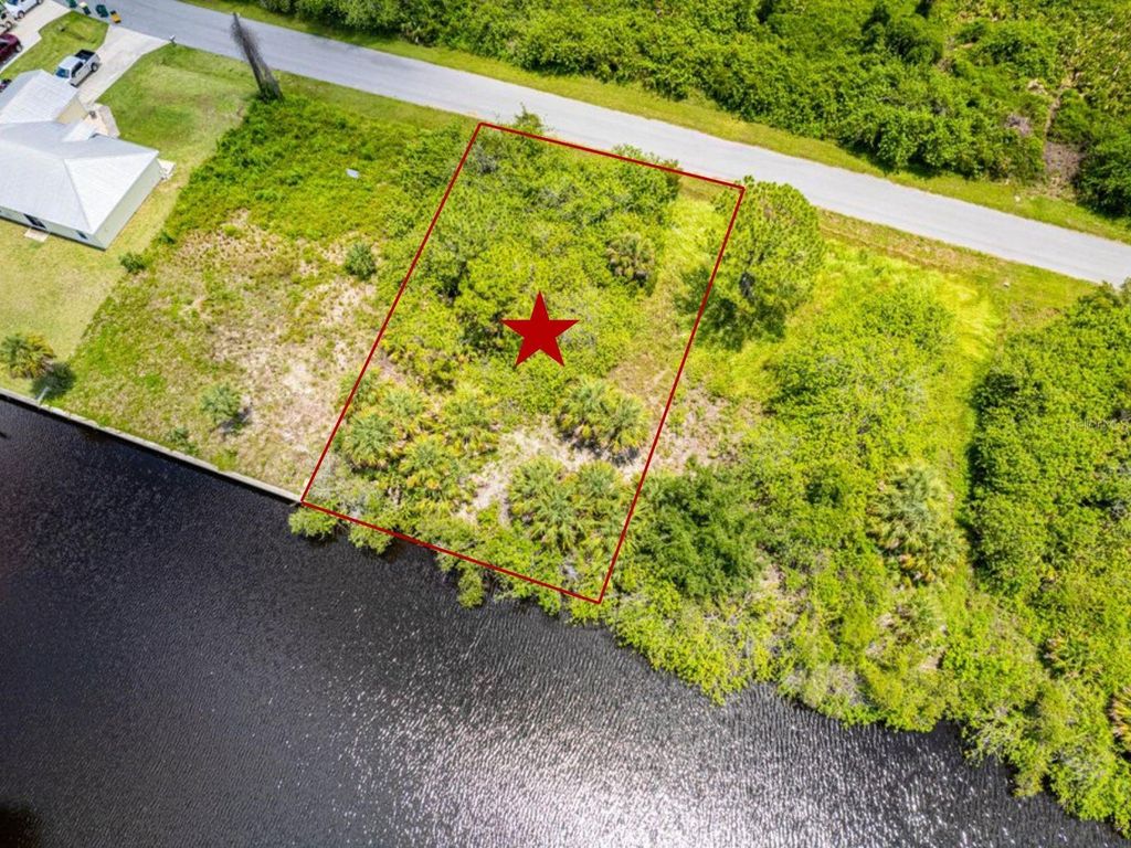 Photo of 12256 Corporal Circle, Port Charlotte, FL 33953 (MLS # C7485065)