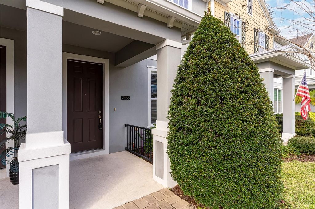 Photo of 7135 Thicket Branch Alley, Windermere, FL 34786 (MLS # O6389351)