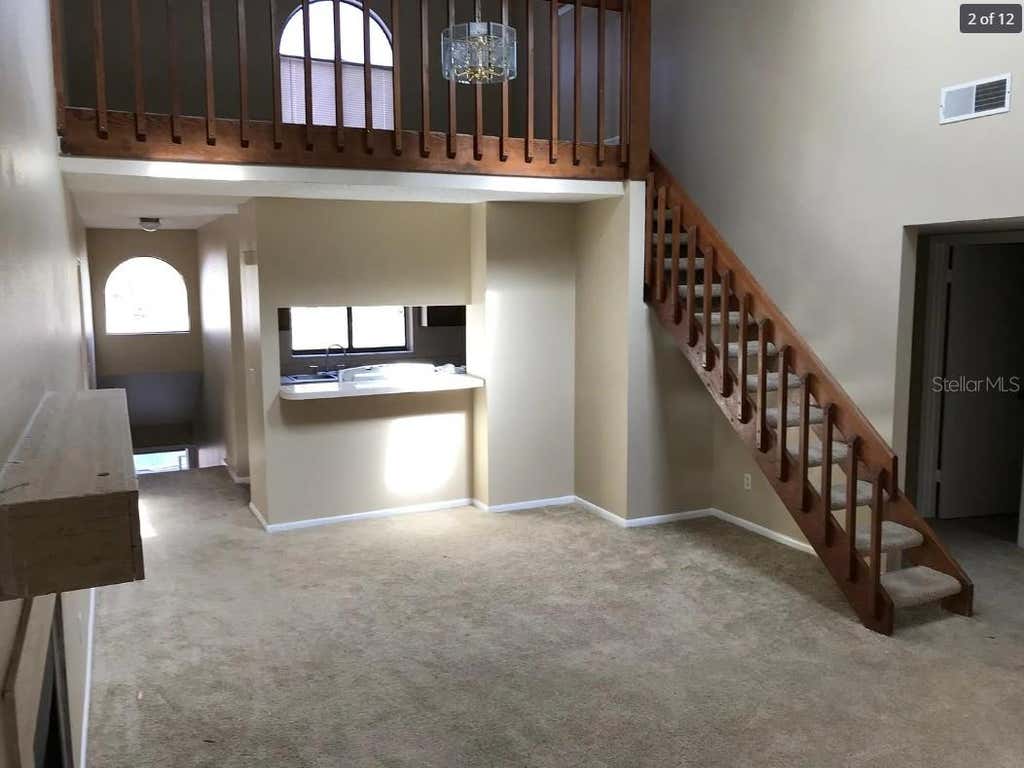 Photo of 4714 Sutton Terrace #115, Orlando, FL 32811 (MLS # O6431546)