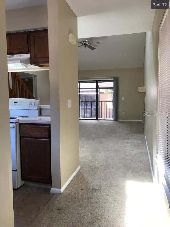 Photo of 4714 Sutton Terrace #115, Orlando, FL 32811 (MLS # O6431546)