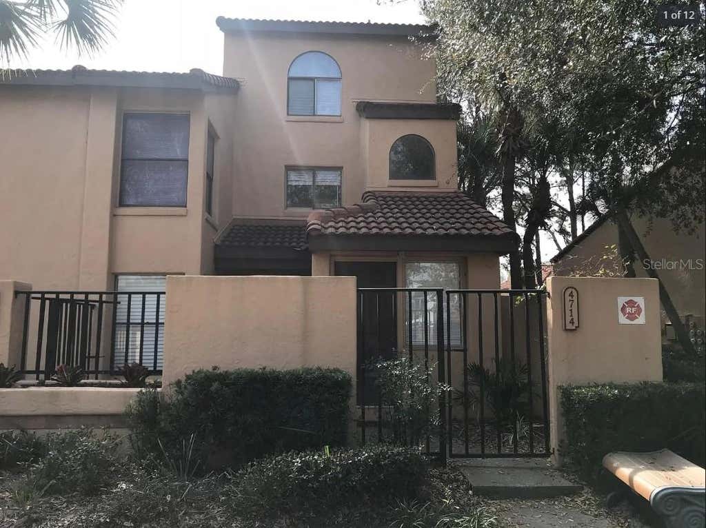 Photo of 4714 Sutton Terrace #115, Orlando, FL 32811 (MLS # O6431546)