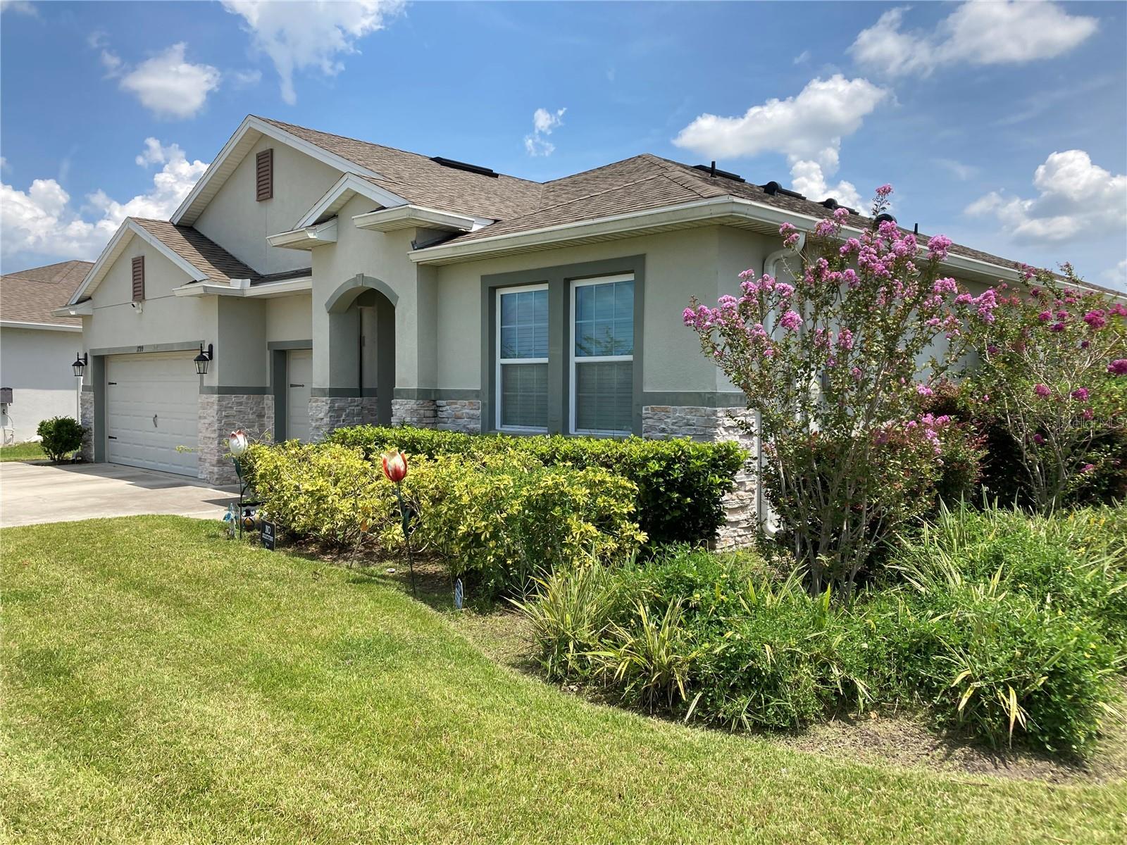 Welcome to a rare opportunity to own a stunning, move-in-ready one-story home on an oversized corner lot in the highly sought-after Kindred community. Designed for both family living and entertaining, this spacious open-concept layout seamlessly connects the modern kitchen to the great room, dining area, and breakfast nook. The great room opens to a screened, covered lanai—perfect for enjoying Florida’s beautiful weather year-round.
This desirable Camden floor plan offers 4 bedrooms and 3.5 bathrooms, including a private in-law suite with its own entrance, bedroom, bathroom, and living/dinette area. It’s ideal for multi-generational living, visiting guests, or even potential rental income. The owner’s suite is thoughtfully positioned apart from the other bedrooms for added privacy.
The kitchen features stainless steel appliances, granite countertops, and ample counter space—ideal for home cooks and hosts alike. The laundry room comes equipped with a washer and dryer for your convenience. All furniture and furnishings are negotiable, making this home truly move-in ready.
Enjoy an unbeatable lifestyle with access to exceptional community amenities, including a clubhouse, resort-style zero-entry pool, splash pad, state-of-the-art fitness center, volleyball and soccer fields, dog park, tennis and pickleball courts, multiple playgrounds, and scenic walking trails—all for under $11/month in HOA fees.
Located just minutes from Downtown Kissimmee, the Florida Turnpike, Orlando International Airport, VA Hospital, Lake Nona/Medical City, shopping centers, and just 30 minutes from major theme parks—this home offers the perfect blend of comfort, convenience, and value. Skip the wait of new construction—your dream home is ready now!