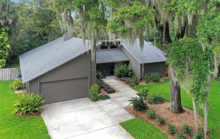 Mid Century Design with large expansive layout.  Beautiful lot with mature trees.  Great eat in kitchen. ;Water: City