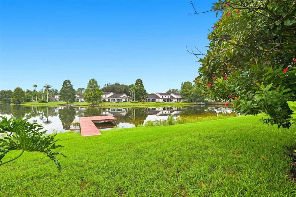 Photo of 1821 Lake Heron Drive, Lutz, FL 33549 (MLS # TB8534057)