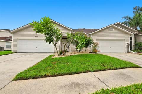 Photo of 1821 Lake Heron Drive, Lutz, FL 33549 (MLS # TB8534057)