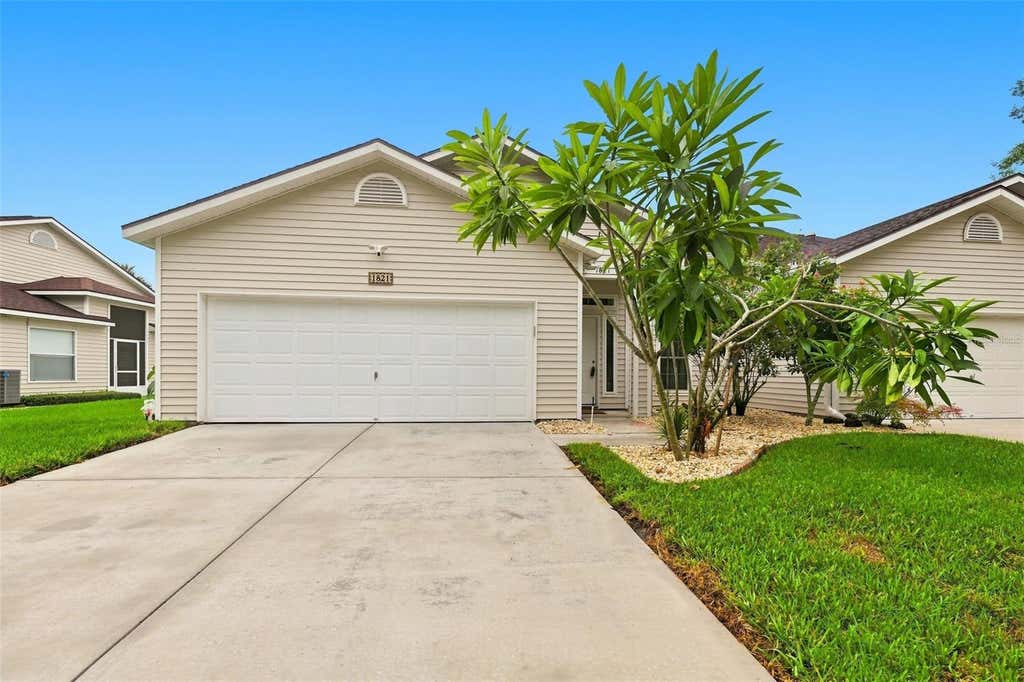 Photo of 1821 Lake Heron Drive, Lutz, FL 33549 (MLS # TB8534057)