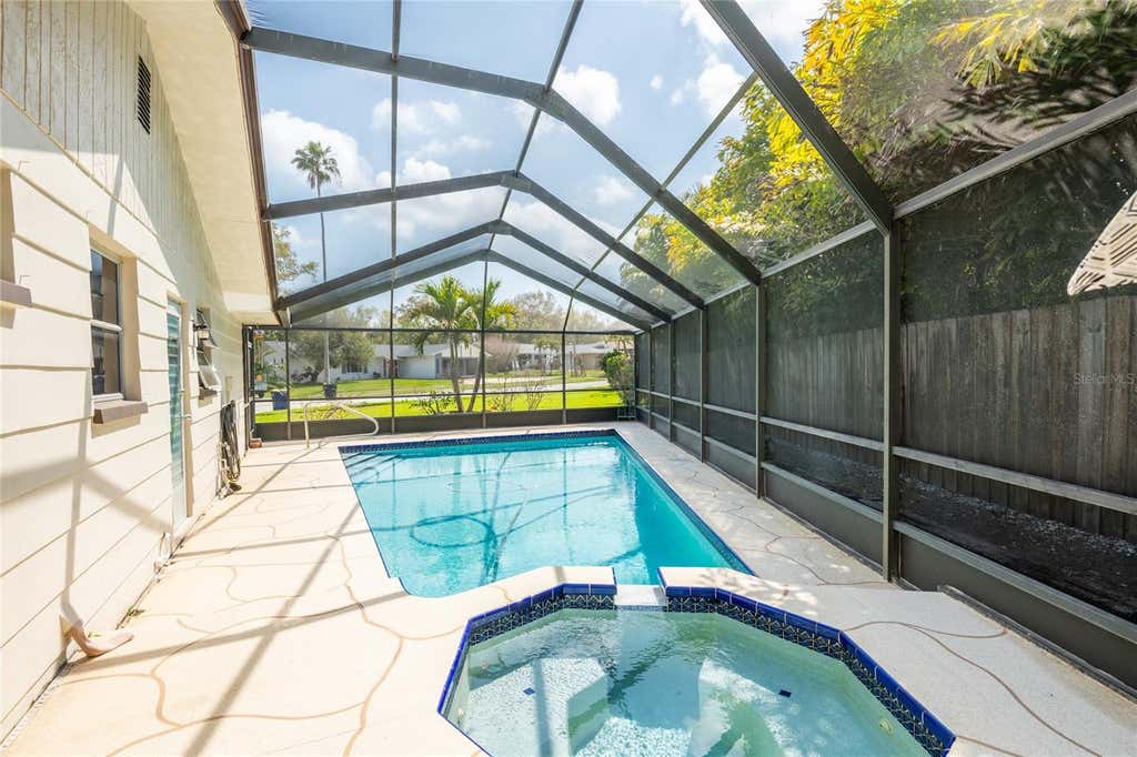 Photo of 1830 Oak Forest Drive S, Clearwater, FL 33759 (MLS # TB8535583)