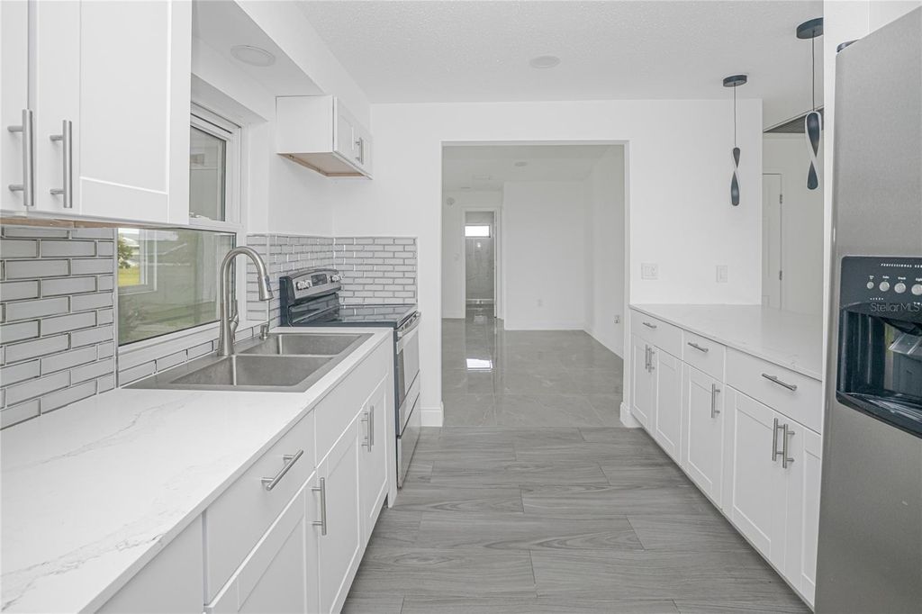 Photo of 22457 Oceanside Avenue, Port Charlotte, FL 33952 (MLS # C7525200)