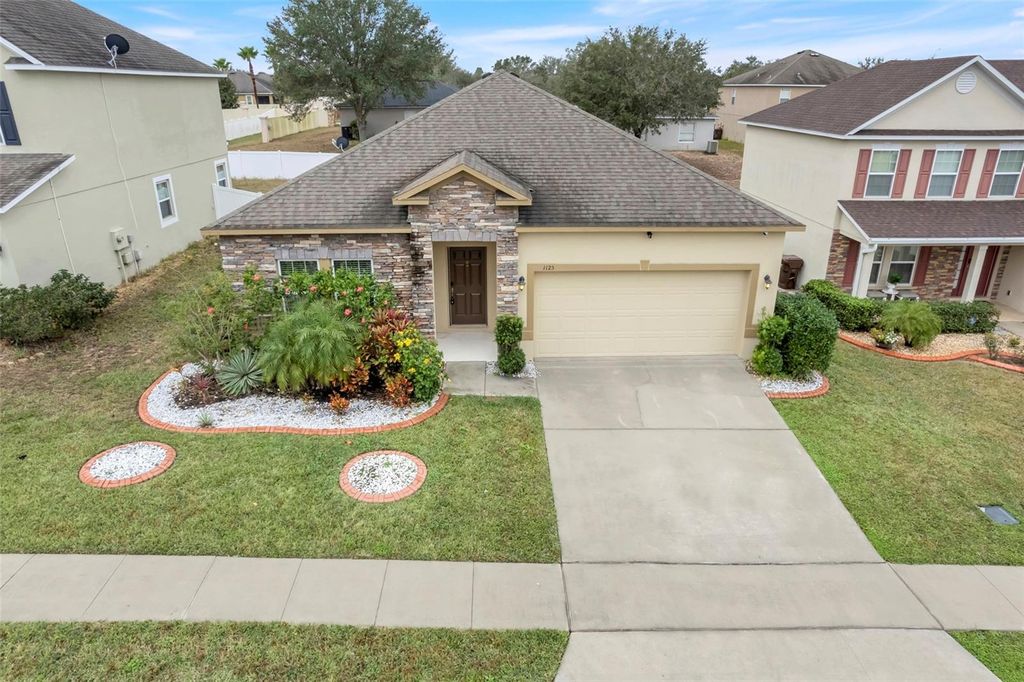 Photo of 1125 Democracy Drive, Haines City, FL 33844 (MLS # O6367862)