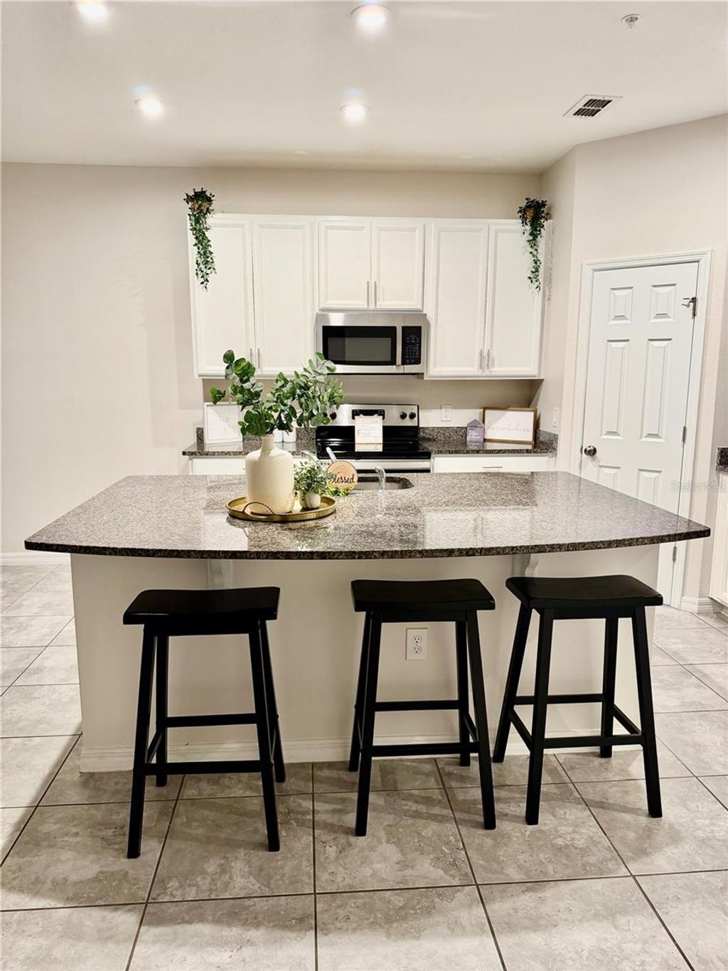 Photo of 10560 Salt Grove Street, Orlando, FL 32824 (MLS # S5141275)