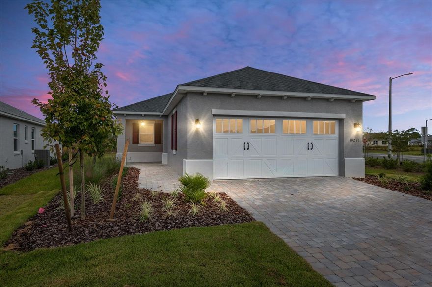 Beautiful Tamar model located in the Longleaf Ridge neighborhood in On Top of the World! This move in ready home has 2 bedrooms, 2 bathrooms, and a two car garage. The entryway leads to the open great room and kitchen. The kitchen features quartz countertops, tile backsplash, 5 burner stove/range/ built in microwave and stainless steel appliances. The master bedroom has vinyl tile, and a walk-in closet. The master bathroom has a large double vanity sink, walk-in tile shower and linen closet.  Located in Ocala’s premier, gated, active 55+ community, loaded with amenities, including golf cart access to two shopping centers.