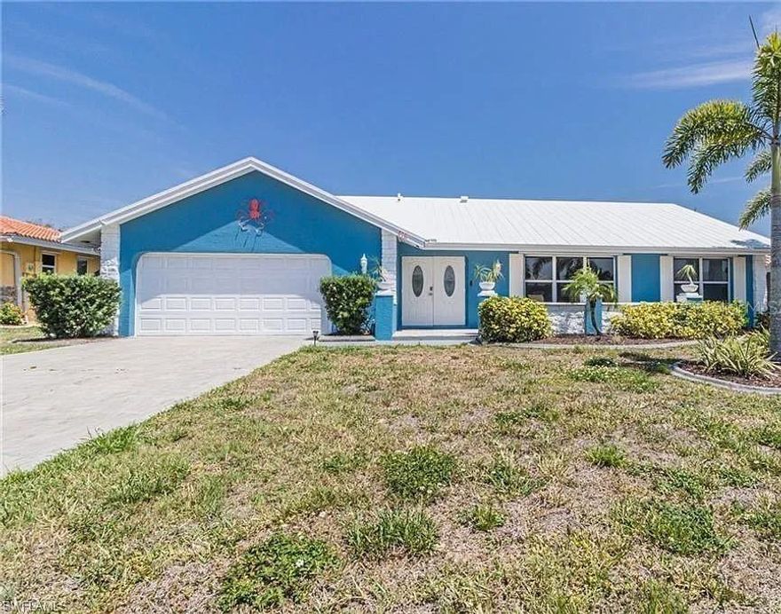 PARADISE FOUND! Experience the ultimate in Florida waterfront living with this beautifully remodeled GULF ACCESS 3-bedroom, 2-bath home in the highly desirable Punta Gorda Isles! Just 10 minutes out to open water, this boater’s dream features a 10,000 lb. boat lift, extended dock, concrete seawall, and plenty of space for all your waterfront toys.

Step inside and fall in love with the bright, open layout — a perfect blend of style and comfort. The spacious living room flows effortlessly into the dining area and stunning updated kitchen, all overlooking the tranquil canal. Enjoy breathtaking sunrise views from your lanai thanks to the home’s ideal Eastern exposure.

Your private master suite offers a peaceful retreat with new sliding doors, a large closet, and a luxurious remodeled bath featuring dual vanities and a walk-in shower. Guests will love their side of the home too, with two spacious bedrooms — one offering direct access to the lanai — and a beautifully updated guest bath.

Outside, entertain in true Florida style! The massive covered lanai is perfect for relaxing in the hot tub or hosting weekend barbecues, and there’s room for a pool if you want to take it to the next level. The shuffleboard court adds a fun touch for family and friends, while the oversized garage and interior laundry room provide plenty of storage space.

This home checks all the boxes — boating, sunshine, fun, and location! Enjoy easy access to shopping, dining, golf, marinas, parks, and Punta Gorda’s famous waterfront lifestyle.
 Start living your dream today — schedule your private or virtual showing before it’s gone!   MORE PHOTOS ARE COMMING SOON.